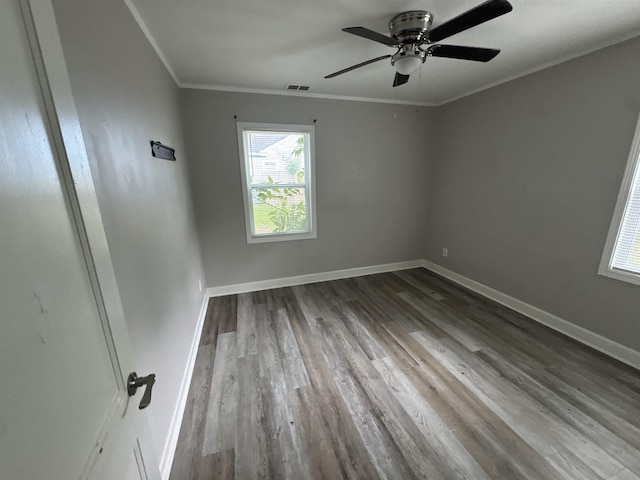 411 Hodges St, Memphis, TN 38111 - unfurnished room featuring wood finished floors, crown molding, ceiling fan, and baseboards