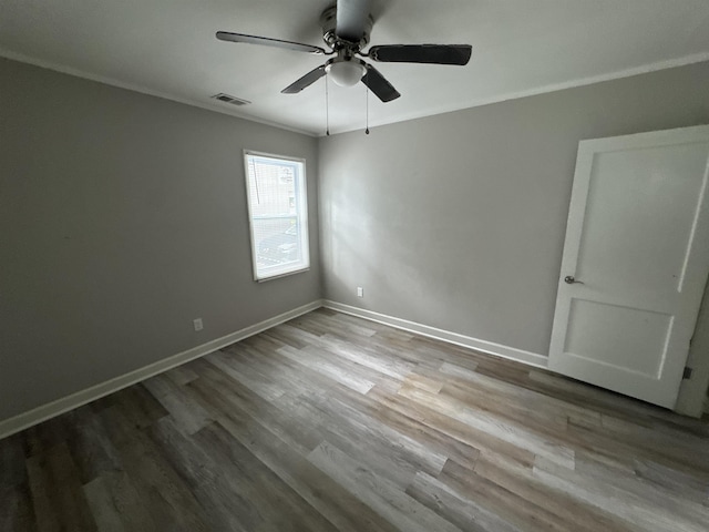 411 Hodges St, Memphis, TN 38111 - unfurnished room with ceiling fan, wood finished floors, baseboards, and crown molding