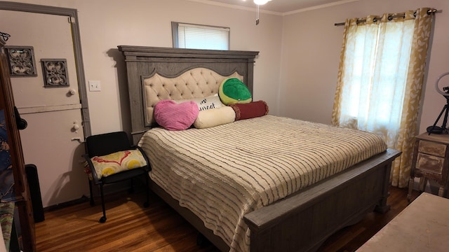 2304 Longstreet Dr, Memphis, TN 38114 - bedroom featuring dark wood-style flooring and ornamental molding