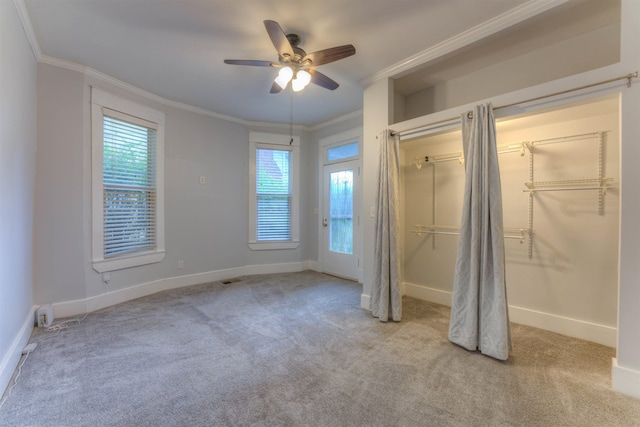 1224 Faxon Ave, Memphis, TN 38104 - unfurnished bedroom with crown molding, carpet floors, baseboards, and a ceiling fan
