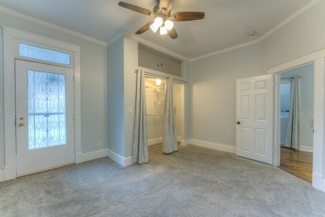1224 Faxon Ave, Memphis, TN 38104 - unfurnished bedroom featuring carpet flooring, ornamental molding, multiple windows, and baseboards