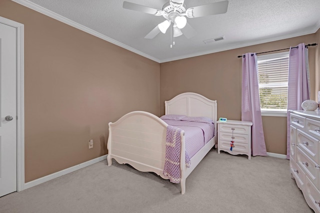 546 Township Cv, Collierville, TN 38017 - bedroom featuring light colored carpet, ornamental molding, baseboards, ceiling fan, and a textured ceiling