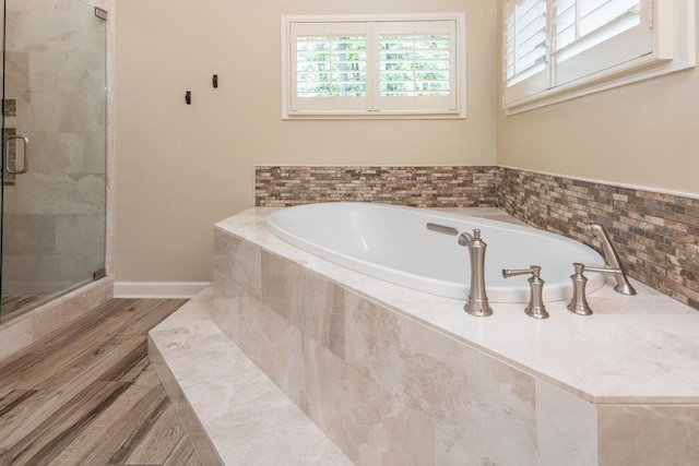 1625 Autumn Tree Cv, Memphis, TN 38016 - full bathroom featuring a garden tub, a stall shower, and healthy amount of natural light