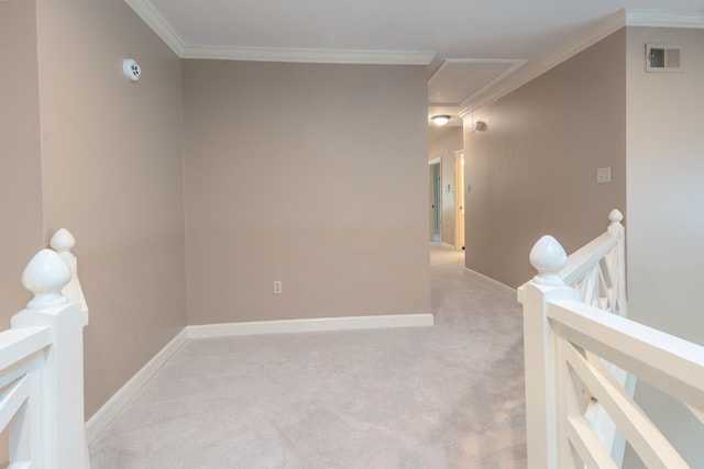 1625 Autumn Tree Cv, Memphis, TN 38016 - hall with attic access, an upstairs landing, light carpet, baseboards, and ornamental molding