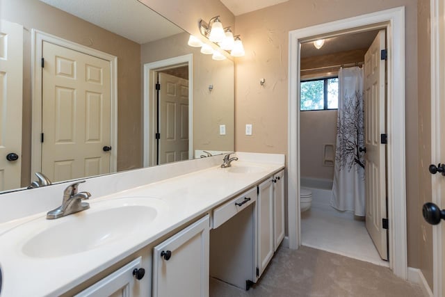 1625 Autumn Tree Cv, Memphis, TN 38016 - full bathroom featuring double vanity, toilet, and shower / tub combo