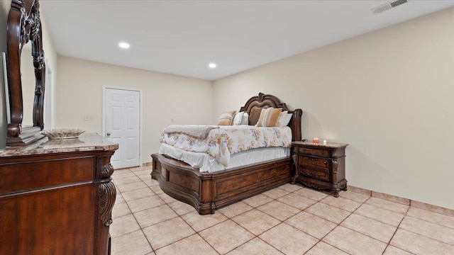 6861 Sauterne Cv, Memphis, TN 38115 - bedroom featuring light tile patterned flooring and recessed lighting