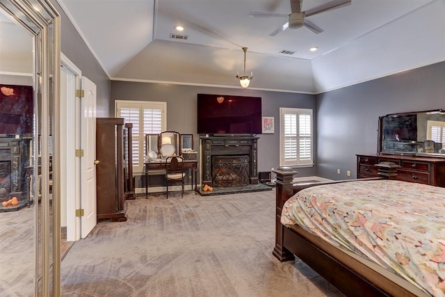 6703 N Kirby Oaks Cv, Memphis, TN 38119 - carpeted bedroom with a fireplace with raised hearth, vaulted ceiling, multiple windows, and baseboards