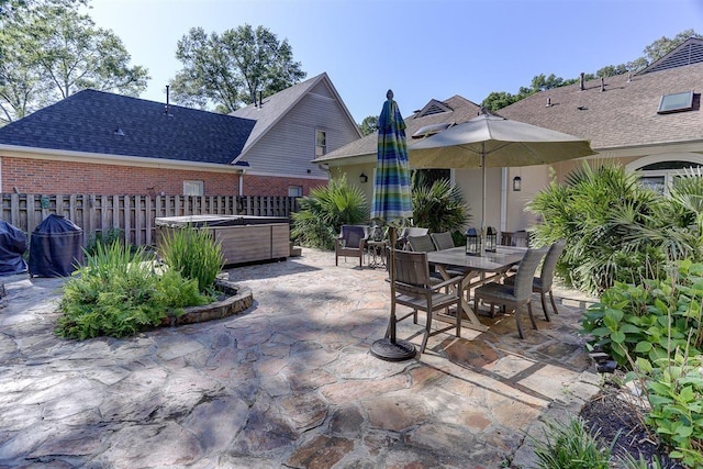 6703 N Kirby Oaks Cv, Memphis, TN 38119 - view of patio / terrace featuring a hot tub and outdoor dining area