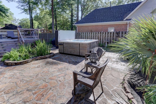 6703 N Kirby Oaks Cv, Memphis, TN 38119 - fenced backyard with a hot tub, a patio, and a deck