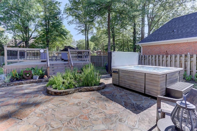 6703 N Kirby Oaks Cv, Memphis, TN 38119 - fenced backyard with a hot tub, a patio area, and a wooden deck