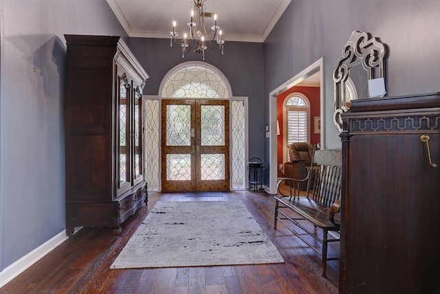 6703 N Kirby Oaks Cv, Memphis, TN 38119 - entrance foyer featuring a chandelier, baseboards, ornamental molding, and hardwood / wood-style floors
