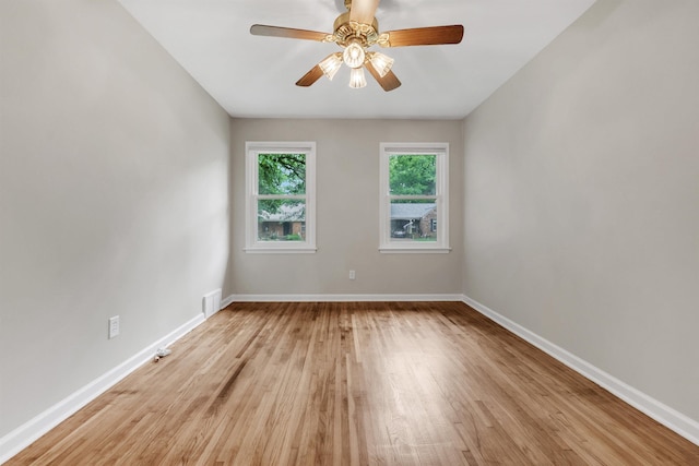 5251 Sequoia Ave, Memphis, TN 38120 - empty room featuring wood finished floors, baseboards, and a ceiling fan
