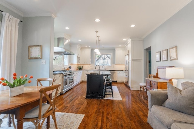 1514 Vance Ave, Memphis, TN 38104 - kitchen featuring ventilation hood, high end appliances, crown molding, open floor plan, and white cabinetry