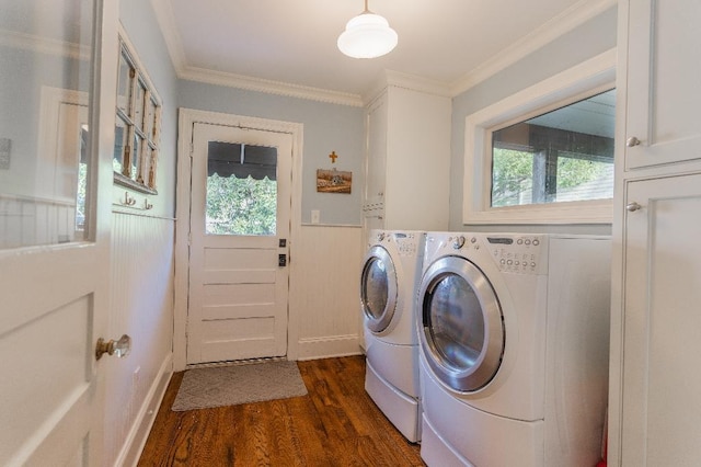 1514 Vance Ave, Memphis, TN 38104 - laundry room featuring cabinet space, washing machine and dryer, healthy amount of natural light, dark wood-style floors, and a wainscoted wall