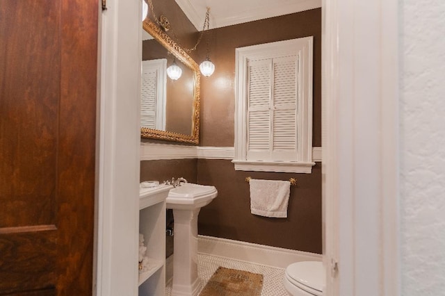 1514 Vance Ave, Memphis, TN 38104 - half bathroom with toilet, tile patterned flooring, and crown molding