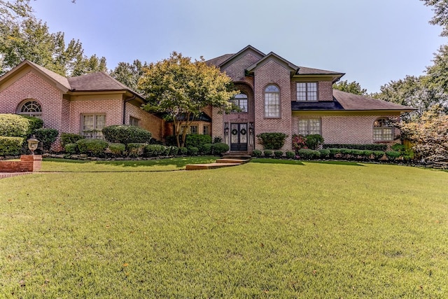 9470 Riveredge Dr, Memphis, TN 38018 - english style home with brick siding and a front yard