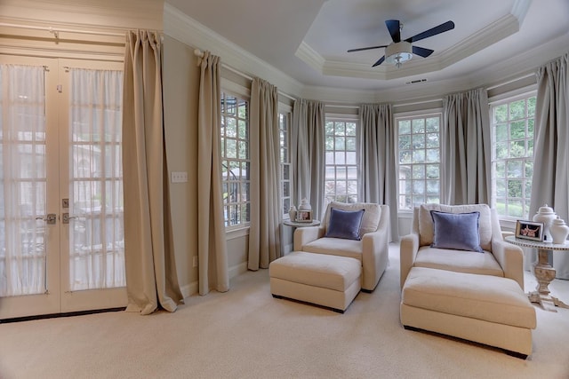 9470 Riveredge Dr, Memphis, TN 38018 - sitting room featuring crown molding, a ceiling fan, carpet floors, a raised ceiling, and french doors