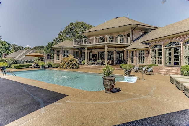 9470 Riveredge Dr, Memphis, TN 38018 - outdoor pool featuring french doors and a patio