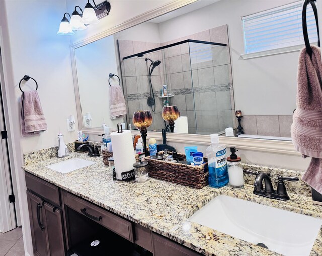 10156 Amberton Cv, Cordova, TN 38018 - bathroom with a stall shower, double vanity, tile patterned floors, and a tub