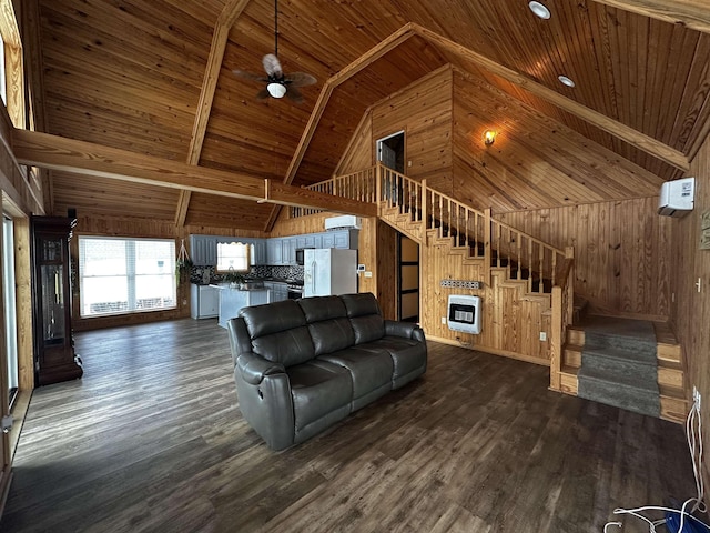552 Catfish Ln, Crump, TN 38327 - living room featuring wood ceiling with exposed beams, heating unit, stairs, wooden walls, and high vaulted ceiling