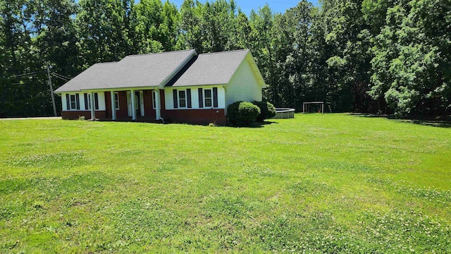 445 Caldwell Rd, Ripley, TN 38063 - view of front of house featuring a front lawn