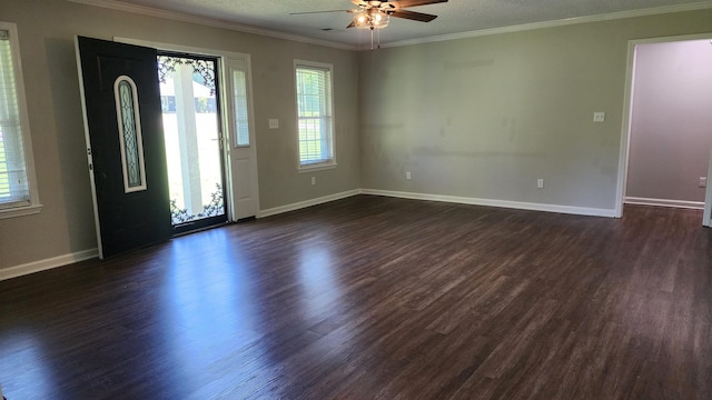 445 Caldwell Rd, Ripley, TN 38063 - entrance foyer with a ceiling fan, dark wood finished floors, baseboards, and ornamental molding