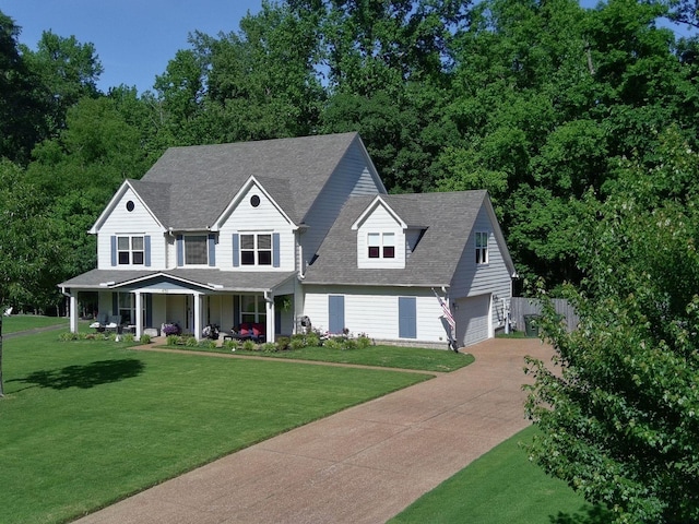 4752 Hampton Ridge Ln, Arlington, TN 38002 - view of front facade with a porch, driveway, and roof with shingles