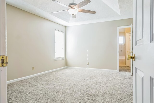 1168 E Red Fern Cir, Cordova, TN 38018 - carpeted empty room featuring healthy amount of natural light, a ceiling fan, a textured ceiling, and baseboards
