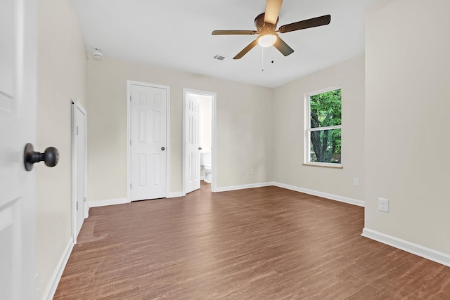 510 Leath St, Memphis, TN 38105 - spare room featuring a ceiling fan, wood finished floors, and baseboards