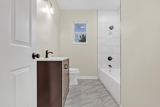 510 Leath St, Memphis, TN 38105 - bathroom featuring marble look tile flooring, toilet, vanity, and  shower combination