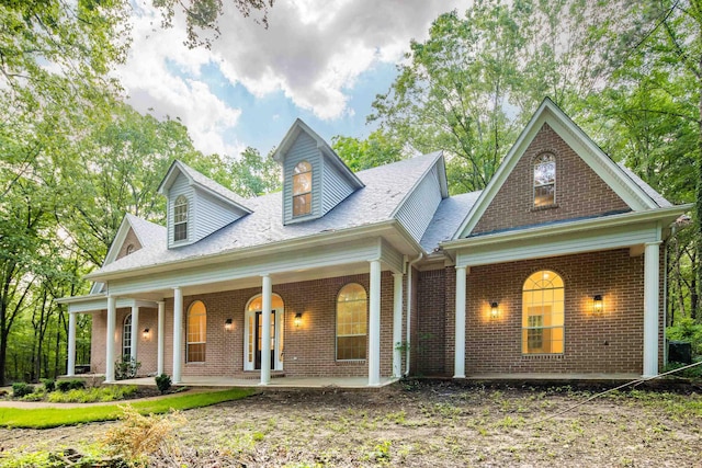 95 Hancock Cv, Eads, TN 38028 - view of front facade featuring brick siding and a porch