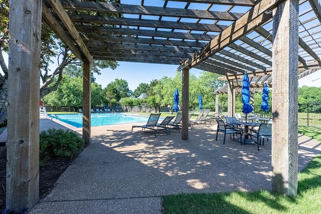 10223 Poston Oaks Cir, Collierville, TN 38017 - view of patio / terrace with a pergola and a community pool