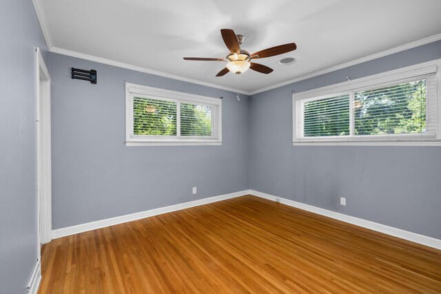 18 N Reese St, Memphis, TN 38111 - empty room with wood finished floors, a ceiling fan, baseboards, and ornamental molding