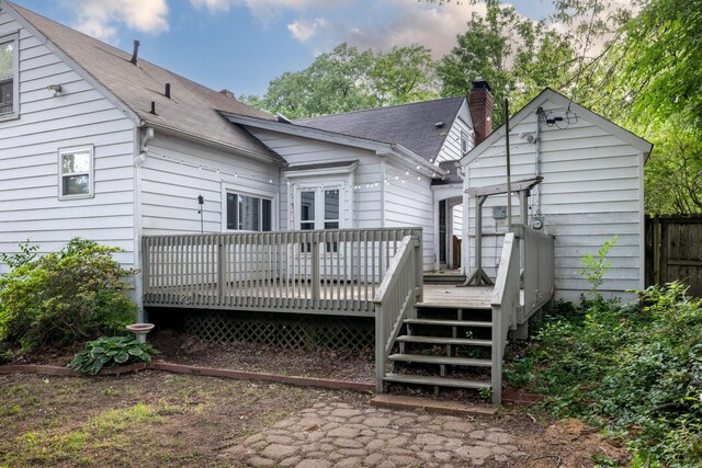 18 N Reese St, Memphis, TN 38111 - back of house with a shingled roof and a wooden deck