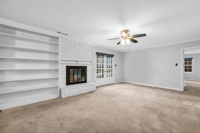2349 Riverdale Rd, Germantown, TN 38138 - unfurnished living room with a ceiling fan, a fireplace, carpet flooring, crown molding, and baseboards