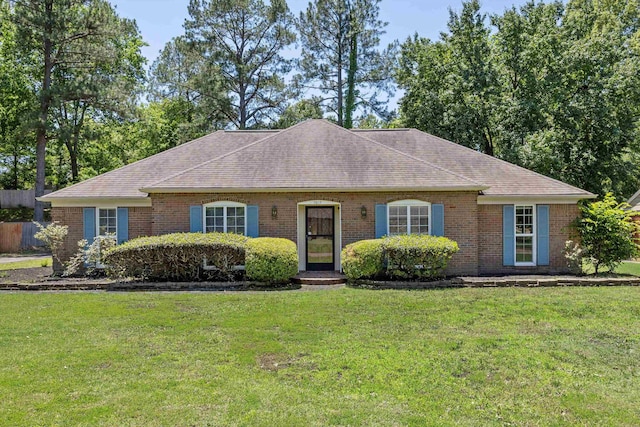 7617 Hollow Fork Rd, Germantown, TN 38138 - ranch-style home with a front lawn, a shingled roof, and brick siding