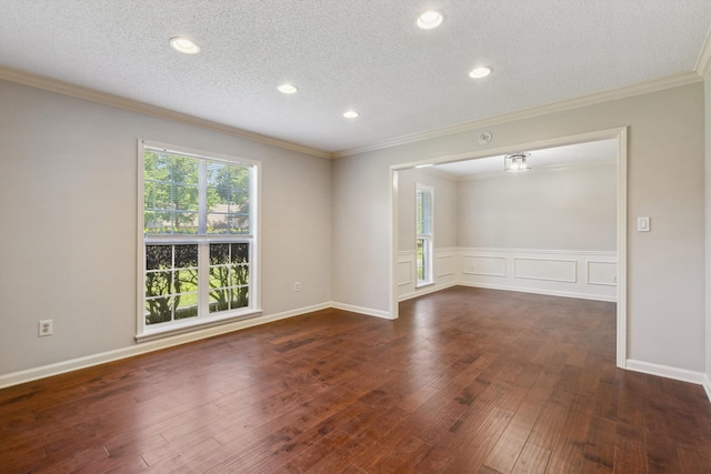 7617 Hollow Fork Rd, Germantown, TN 38138 - empty room featuring wood-type flooring, a textured ceiling, crown molding, and recessed lighting