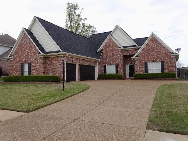 1166 Sanbyrn Dr, Cordova, TN 38018 - traditional-style home with driveway, brick siding, a front lawn, roof with shingles, and a garage