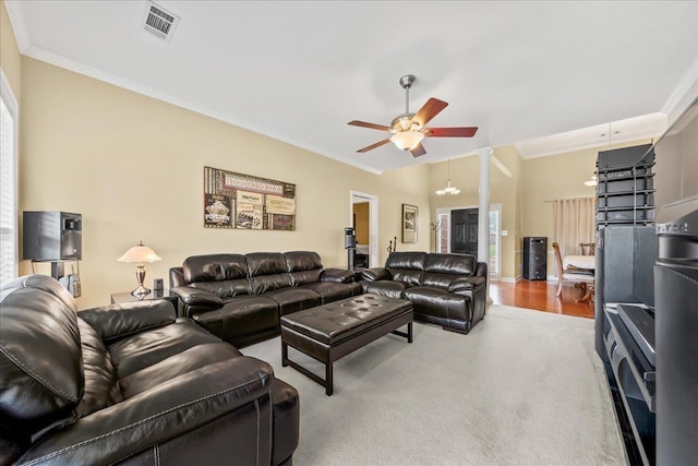 1166 Sanbyrn Dr, Cordova, TN 38018 - carpeted living area with crown molding and ceiling fan