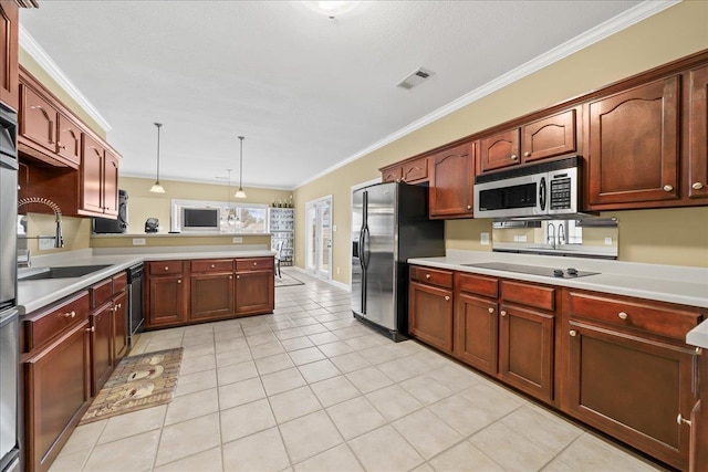 1166 Sanbyrn Dr, Cordova, TN 38018 - kitchen with black appliances, a sink, light countertops, a peninsula, and hanging light fixtures