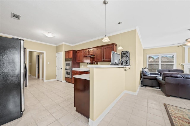 1166 Sanbyrn Dr, Cordova, TN 38018 - kitchen with appliances with stainless steel finishes, light tile patterned flooring, open floor plan, light countertops, and ornamental molding