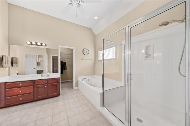 1166 Sanbyrn Dr, Cordova, TN 38018 - full bathroom with vanity, a stall shower, a garden tub, lofted ceiling, and a ceiling fan
