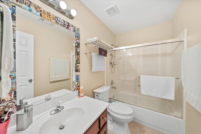 1166 Sanbyrn Dr, Cordova, TN 38018 - full bathroom featuring vanity, toilet, combined bath / shower with glass door, and tile patterned flooring