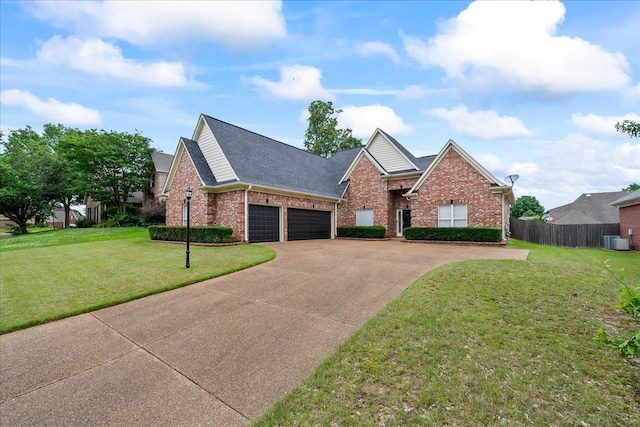 1166 Sanbyrn Dr, Cordova, TN 38018 - view of front of home featuring central air condition unit, a garage, brick siding, concrete driveway, and roof with shingles