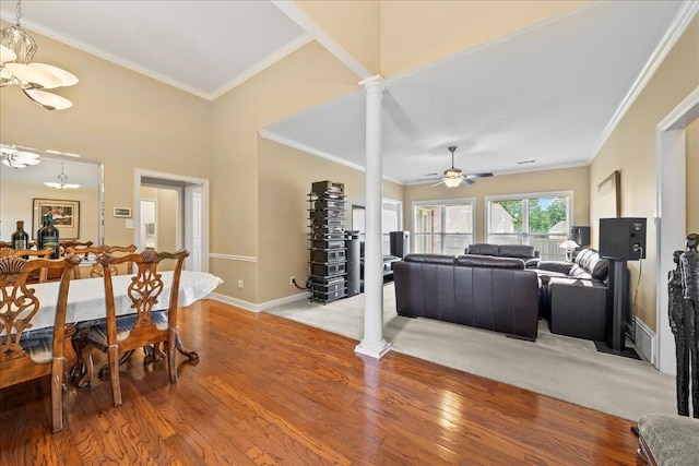 1166 Sanbyrn Dr, Cordova, TN 38018 - living room with wood finished floors, a chandelier, baseboards, ceiling fan, and crown molding