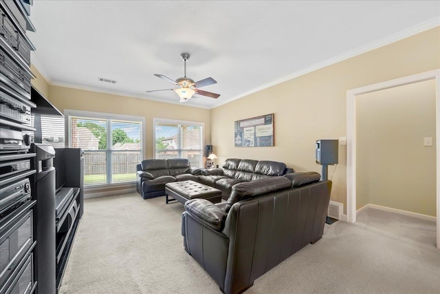 1166 Sanbyrn Dr, Cordova, TN 38018 - living area featuring light carpet, a ceiling fan, ornamental molding, and baseboards