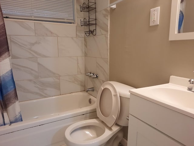 3989 Martindale Ave, Memphis, TN 38128 - bathroom featuring shower / tub combo with curtain, toilet, and vanity