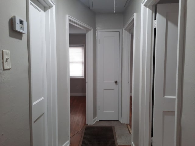 3989 Martindale Ave, Memphis, TN 38128 - hallway featuring attic access and baseboards