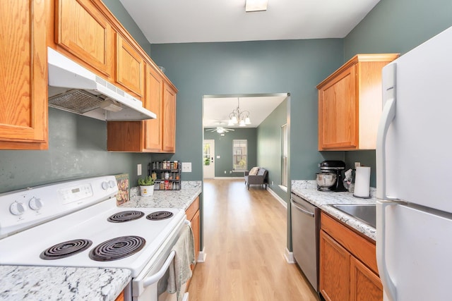 631 Peyton Cir, Memphis, TN 38107 - kitchen with white appliances, under cabinet range hood, light wood-style flooring, a chandelier, and light countertops