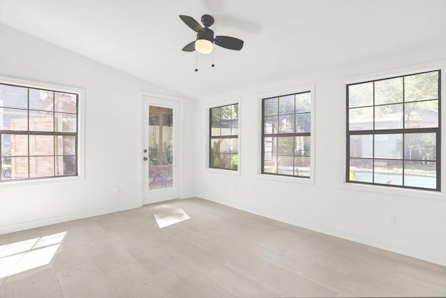 1995 Walker Ave, Memphis, TN 38104 - unfurnished room with lofted ceiling, a ceiling fan, and baseboards